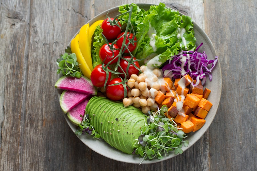 Rainbow buddha bowl with avocado, chickpeas and sweet potato